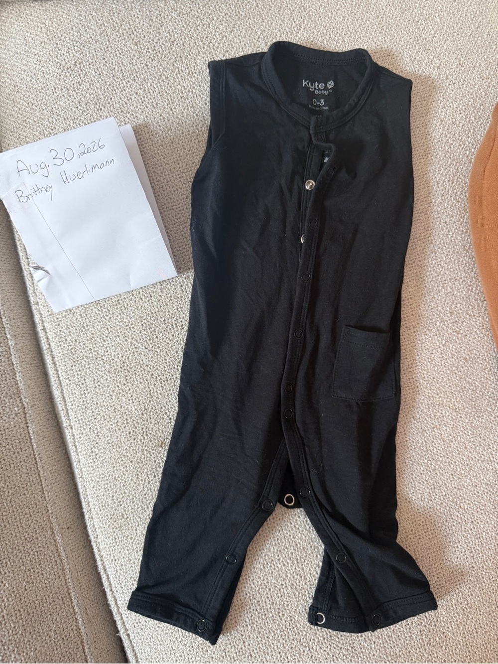 Kyte BABY Black Sleeveless Baby Romper with Pocket